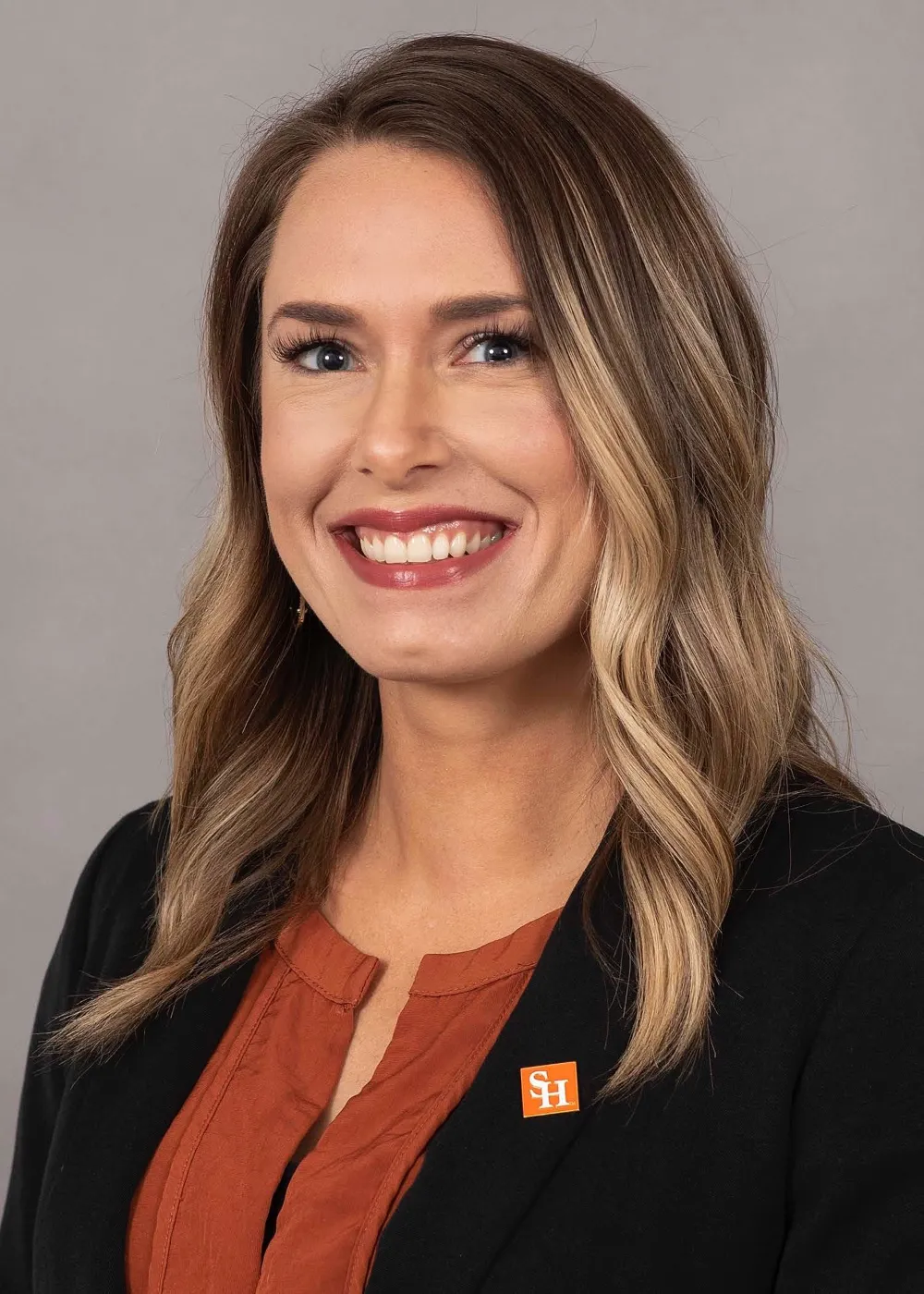 Damon Andrews smiles for a photo.