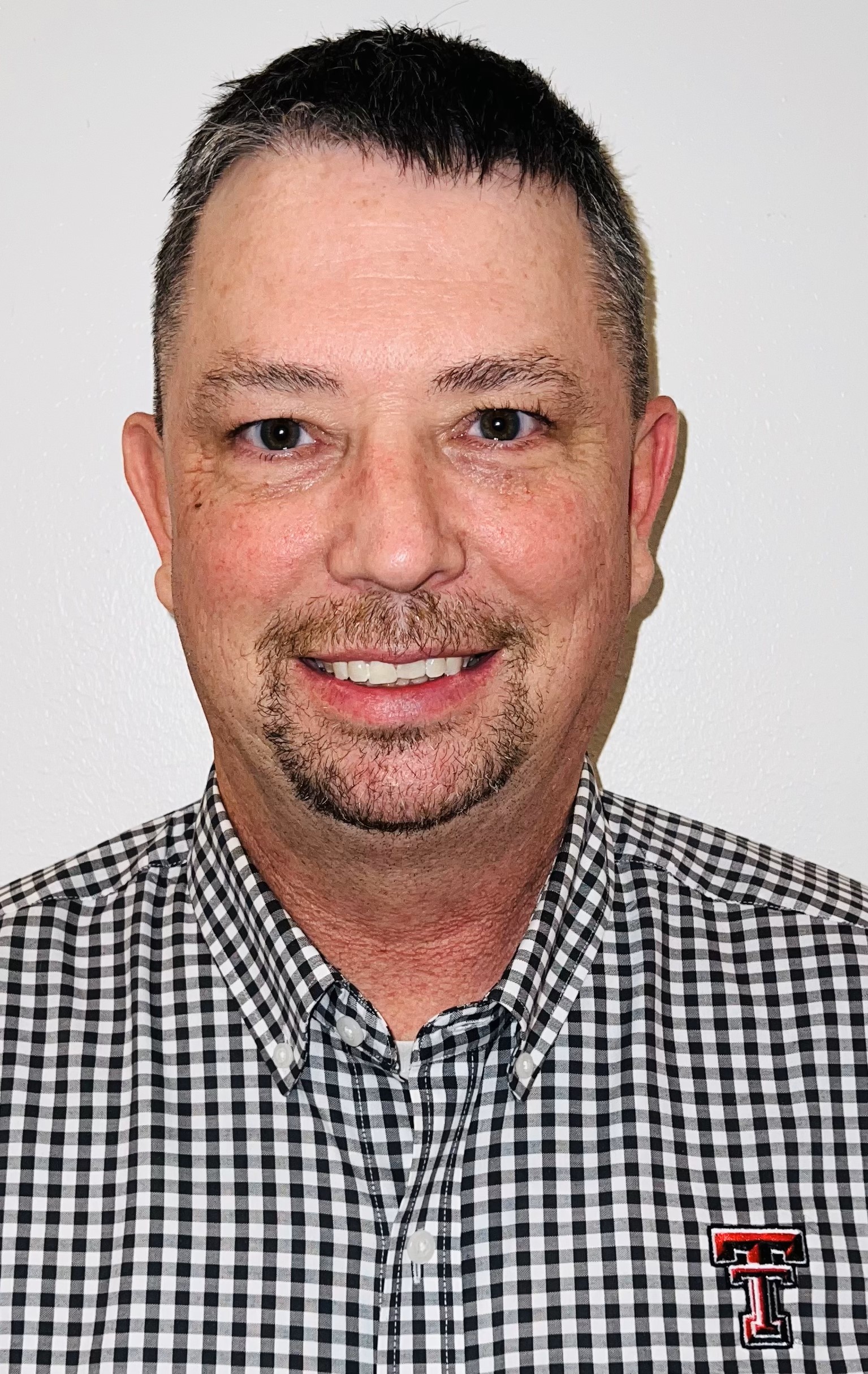 Angela Chevalier smiles for a photo.