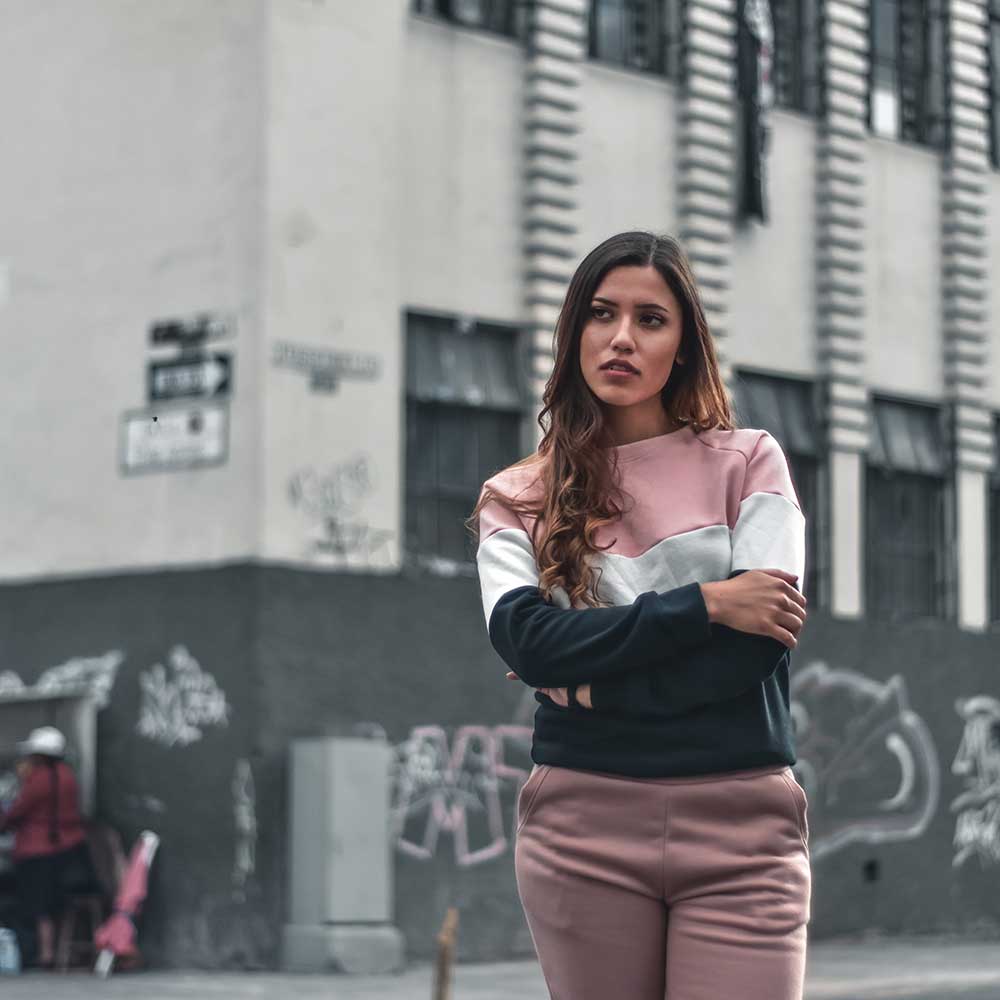 Photo By di-go-f-c-rrion, Unsplash woman standing in an alley